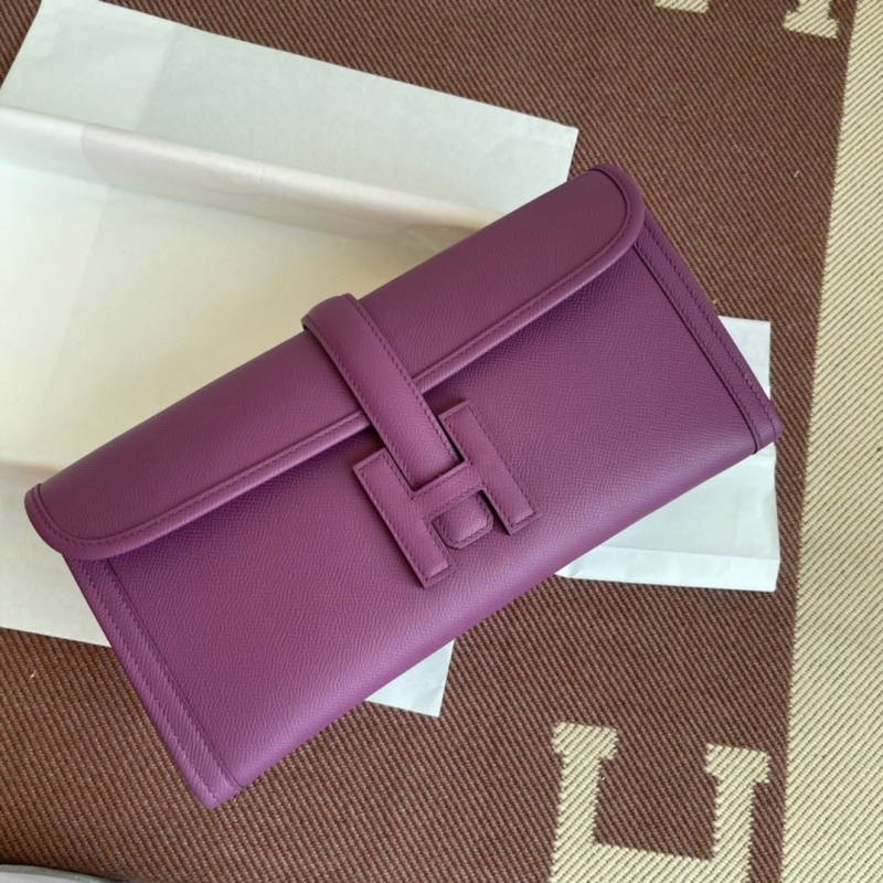 H**mes clutch bags